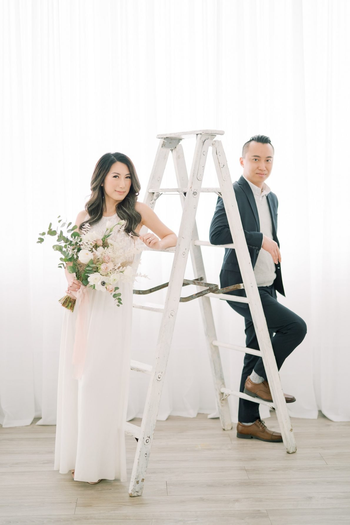 Stunning couple in Dreamy Toronto Engagement Photos Mint Room Studio Conservatory